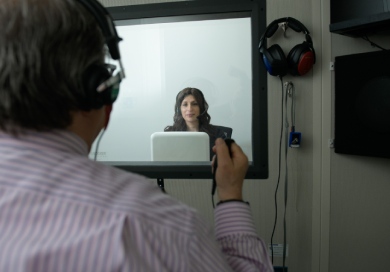 Audiologist Dr Fogel Conducting Hearing Test